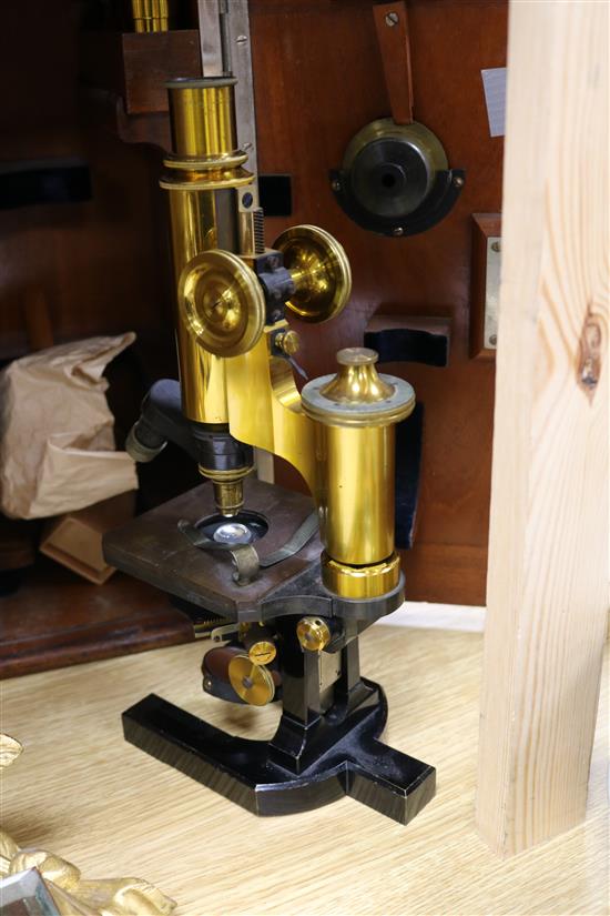 A Carl Zeiss Jena lacquered brass and black enamelled microscope, No. 16808, 37cm high